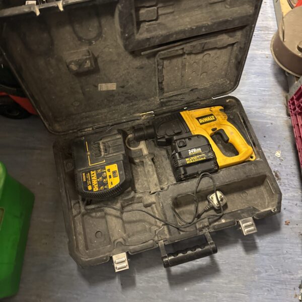 Dewalt SDS cordless drill in open carrying case.
