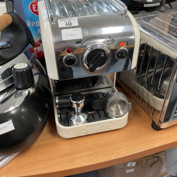 Polished chrome Dualit coffee machine for brewing espresso and coffee.
