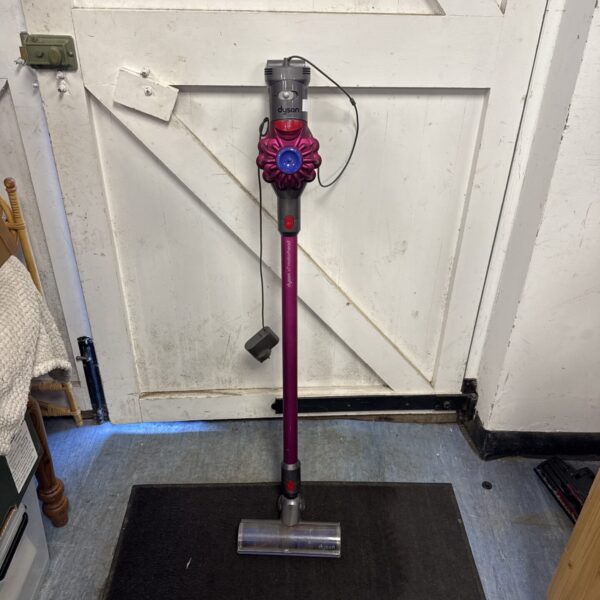Purple Dyson V7 Motörhead cordless vacuum cleaner on display.