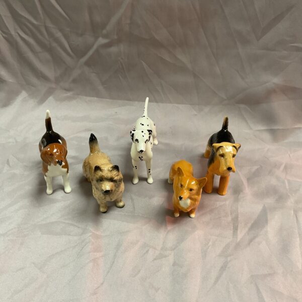 Vintage Beswick dog figurines in a collectible lot.