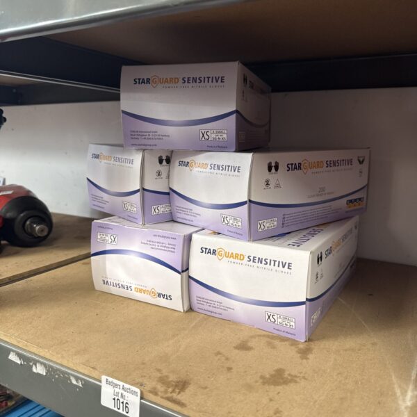 Five boxes of powder-free nitrile gloves size XS.