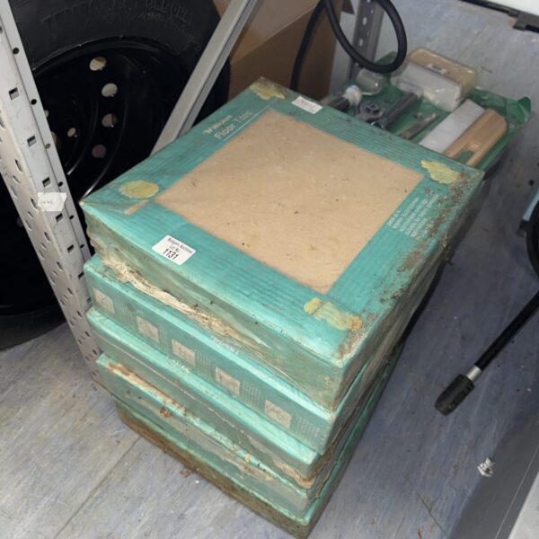 Pack of Wickes 333x333mm ceramic floor tiles for home improvement.