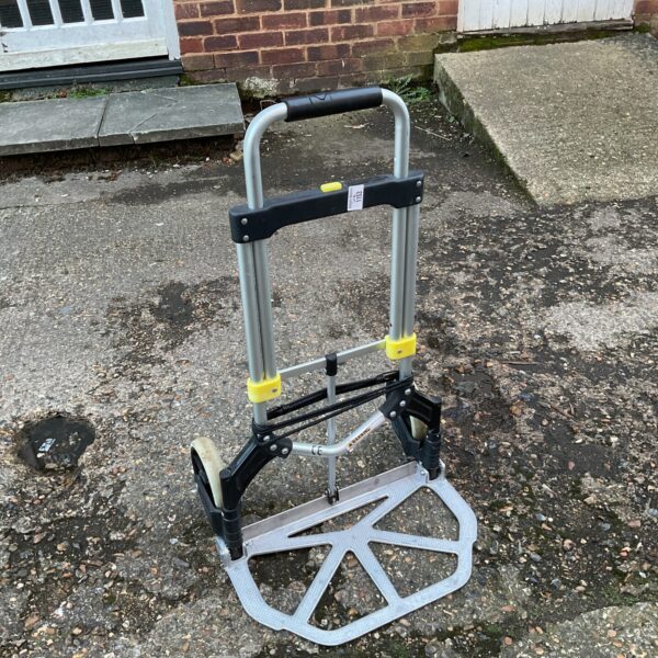 Used folding sack barrow with steel frame and plastic deck.