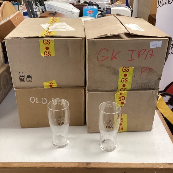 Stack of four boxes containing Greene King IPA pint glasses.