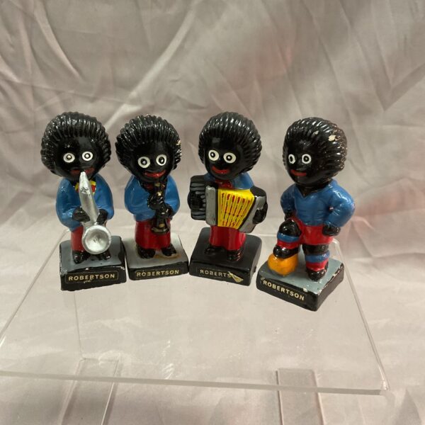 Vintage Robertson gollies band figures playing instruments.