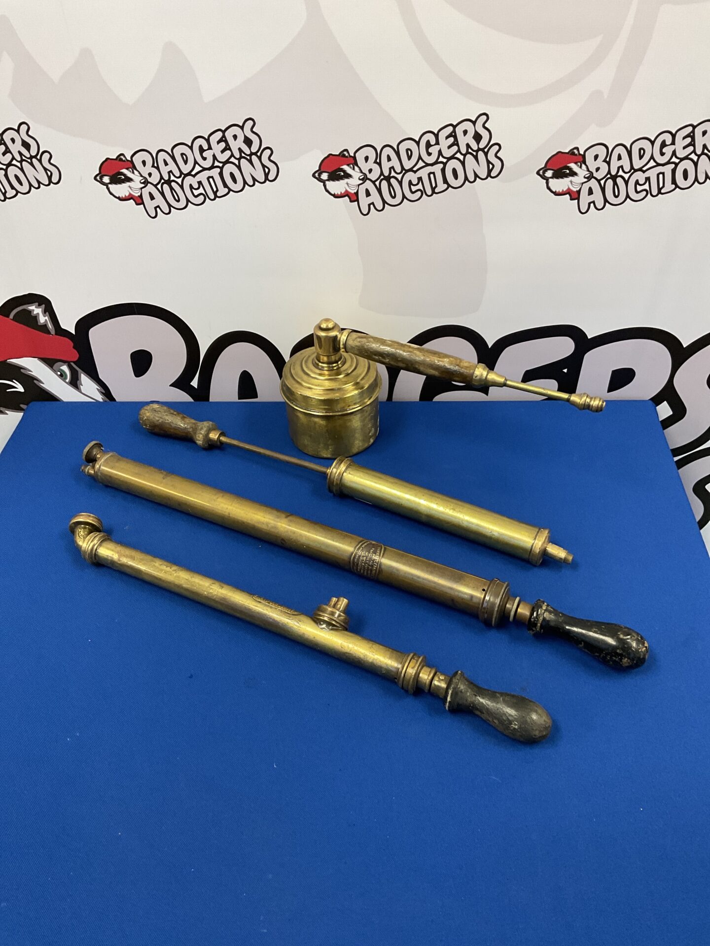 091 Four vintage & antique brass rose sprayers