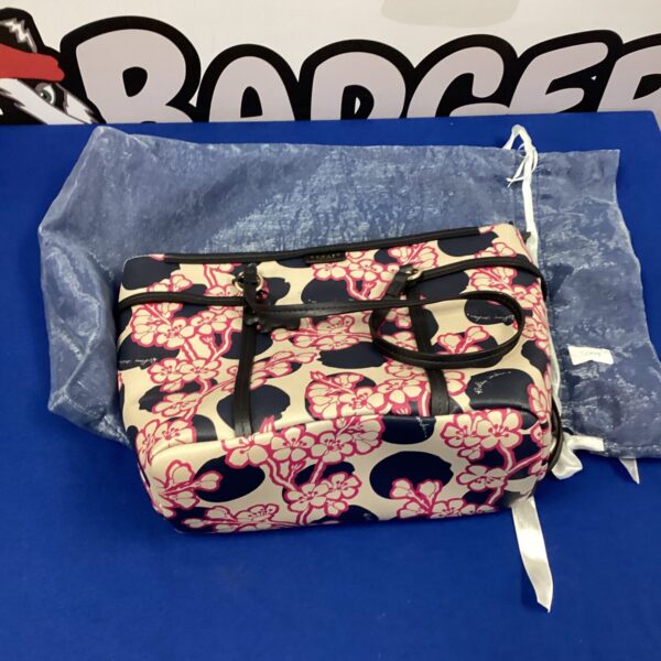 Vibrant Radley handbag with blue and pink floral design.