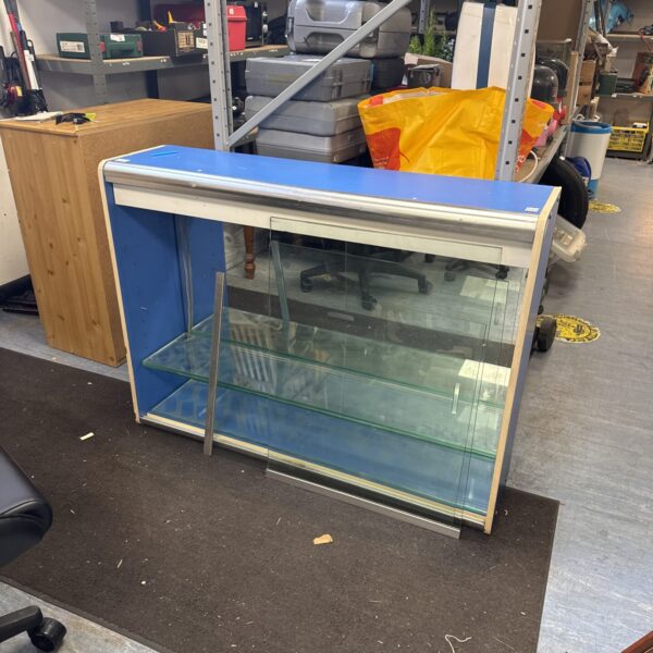 Vintage shop display cabinet with glass front.