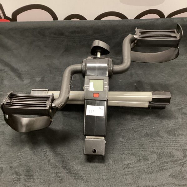 Front view of a vintage Himaly exercise bike.
