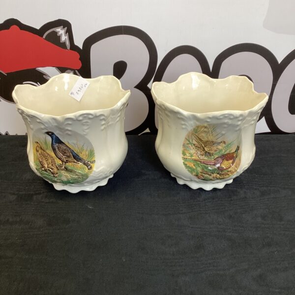 Pair of vintage porcelain flower pots with pheasant design.