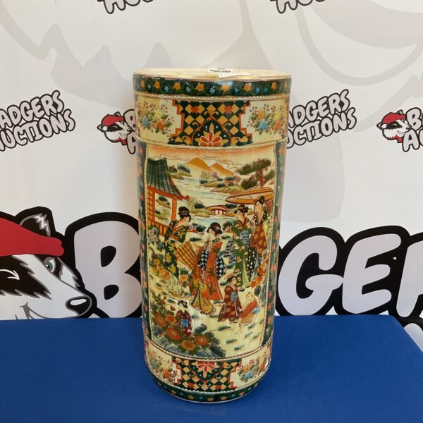 Antique Chinese porcelain stick stand with hand-painted figures.