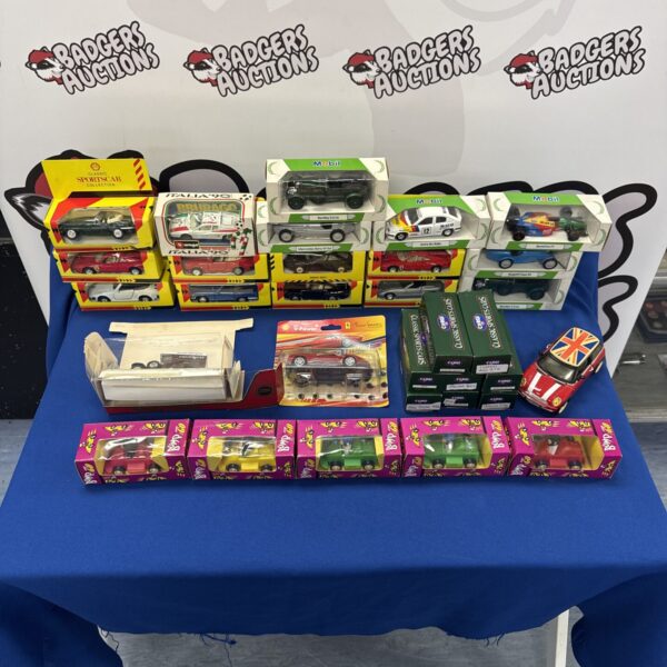 A lot of vintage diecast cars including Corgi models.