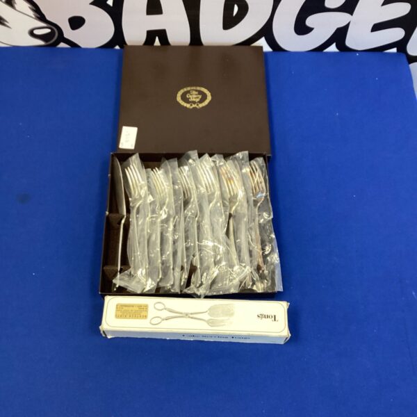 Vintage silver plate fish fork and knife set with cake tongs.