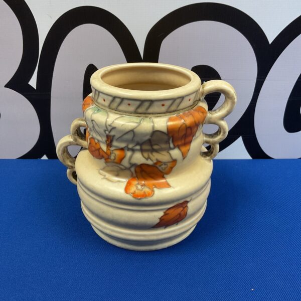 Vintage Charlotte Rhead Crown Ducal vase with floral design.