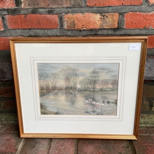 Framed pastel painting of flamingos by Janet Pidoux.
