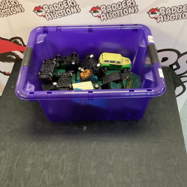 A box of various diecast Land Rover models from Corgi and Majorette.
