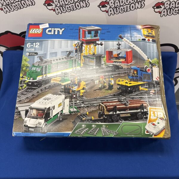 Lego City 60198 train set with station and railway tracks.