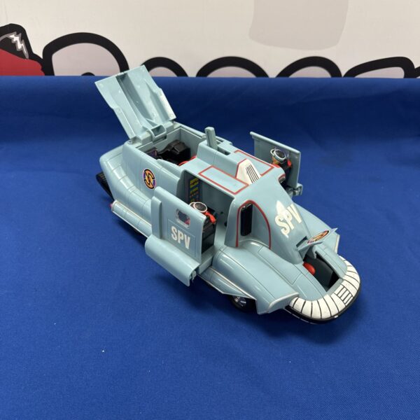 Vintage 1994 Captain Scarlett SPV vehicle with figures and missile.