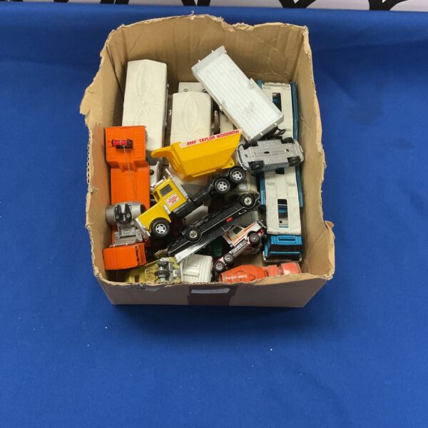 Mixed lot of vintage and modern diecast trucks for collectors.
