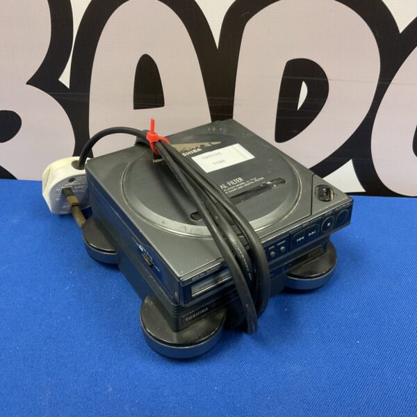 Vintage Toshiba CD Walkman portable CD player in used condition.