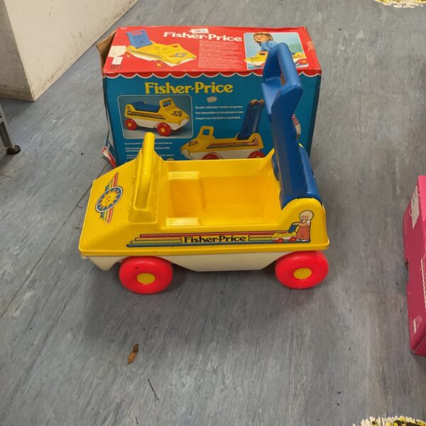 Vintage Fisher Price baby walker, a classic toddler toy for early steps.