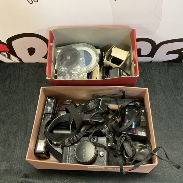 Fujifilm X20 camera lot with accessories for collectors.