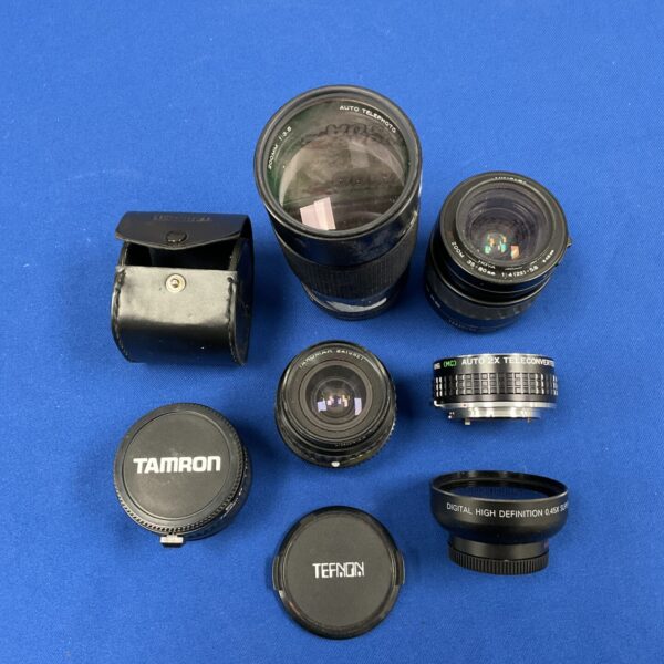 Selection of vintage camera lenses including Vivitar and Minolta.