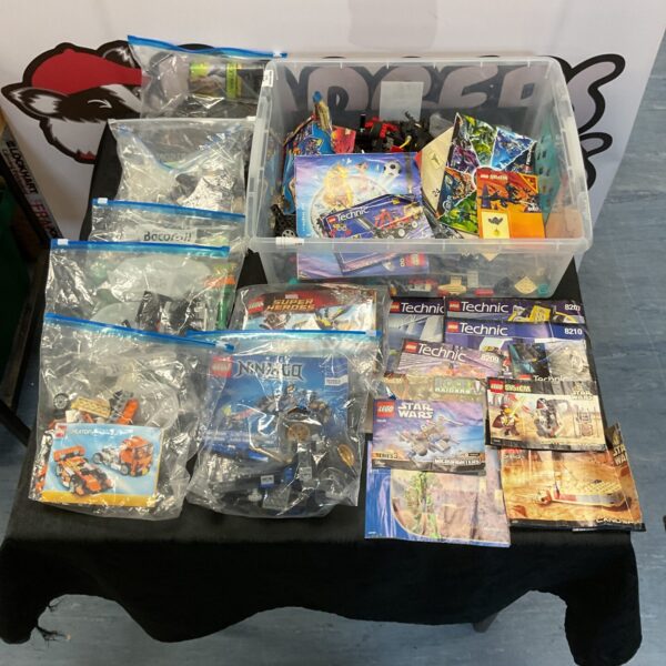 Mixed Lego lots with vintage manuals for building and collecting.