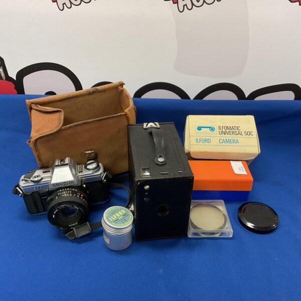 Vintage Minolta XD-11 35mm film camera in used condition.