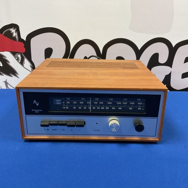 Vintage Armstrong 523 tube tuner with classic dial.