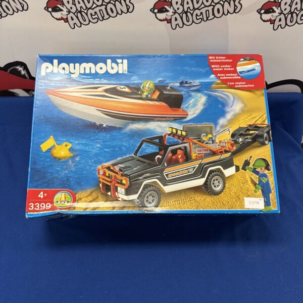Sealed vintage Playmobil 3399 Speedstar Jeep & Speedboat set in packaging.