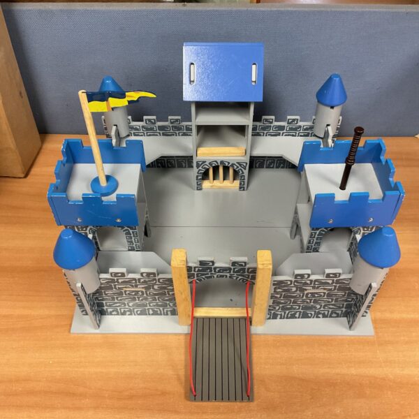 Vintage wooden castle toy with drawbridge, collectible castle.
