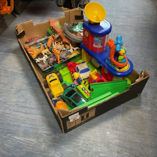 Colourful childrens toy lot with farm animals and vehicles.