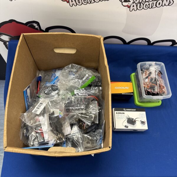 Large lot of radio control car parts and accessories for hobbyists.