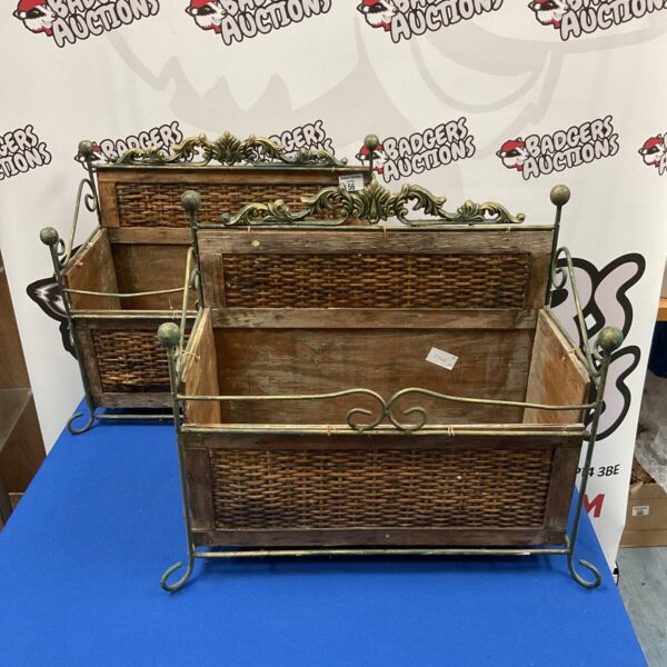 Vintage wicker magazine rack pair with metal frame.