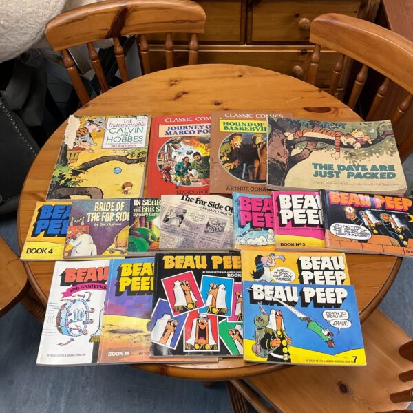 Vintage adult comic book collection featuring Beau Peep and Far Side comics.