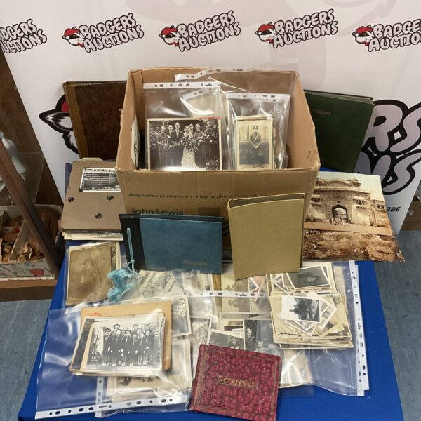 Large collection of vintage photographs and antique portraits.