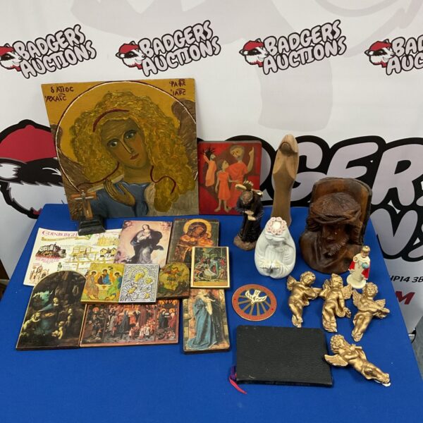 Vintage religious icon collection with painted ornaments.