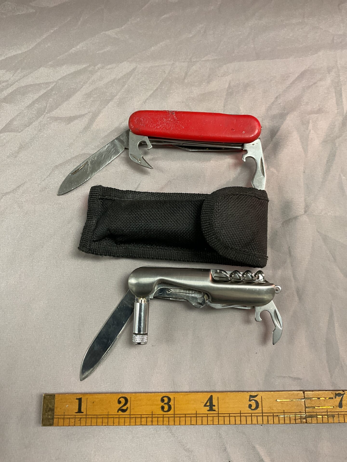 791 Two pocket knives and one case