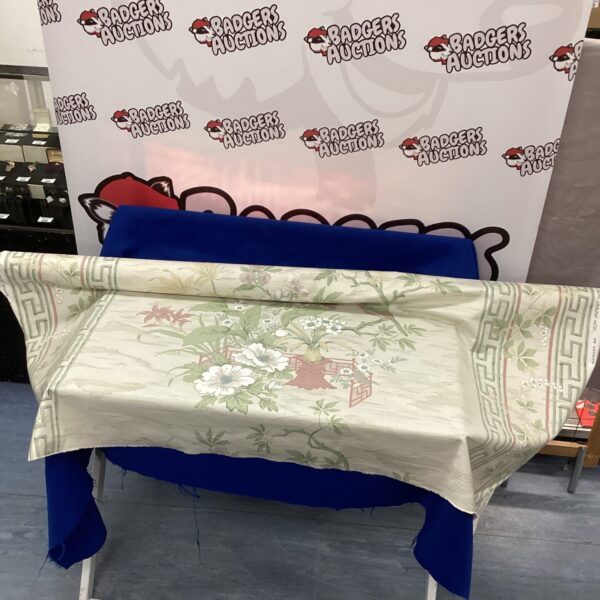 Vintage Mandarin Bay fabric roll with floral print.