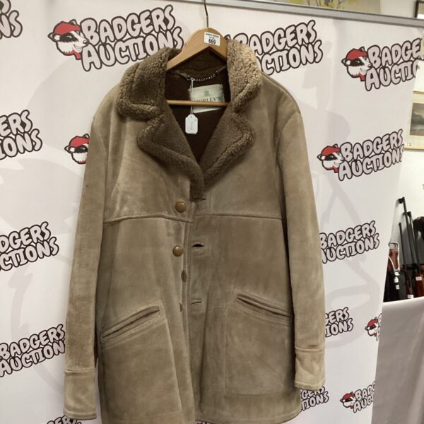 Genuine leather Morley sheepskin coat size L for winter warmth.