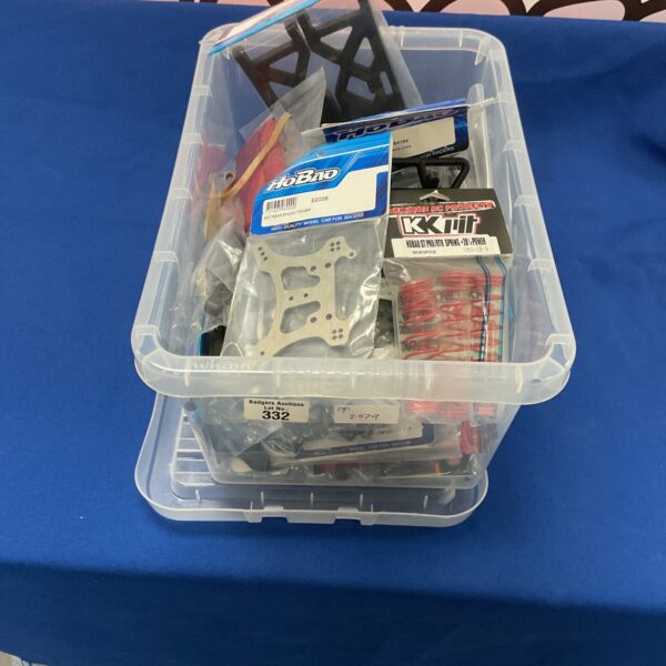 HoBao RC car parts lot in original packaging, radio control model components.