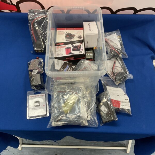 Lot of radio control car parts and components for hobbyists.