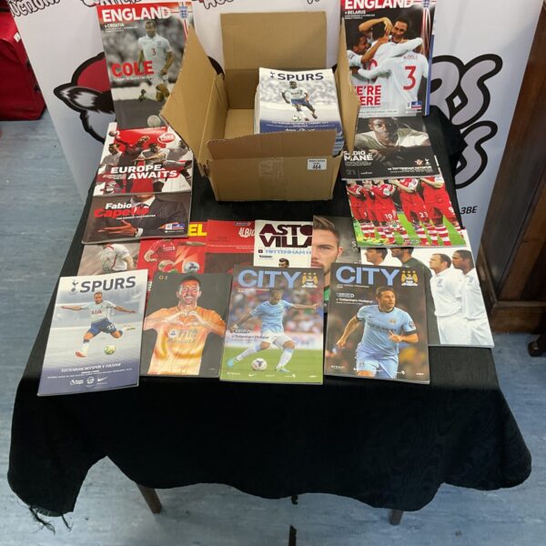 Stack of vintage football books including Spurs and Liverpool titles.