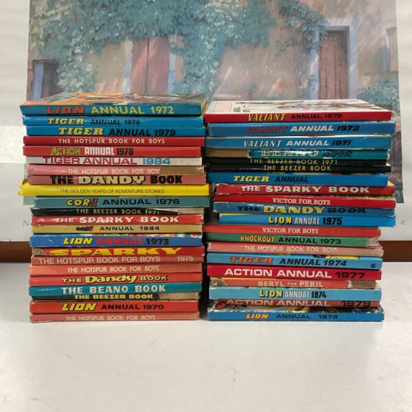 Vintage collection of British comic annuals including Dandy, Beano, Valiant and Lion.