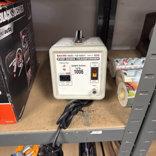 Black Sanyo tsd-n06ex step down transformer for electronics projects.
