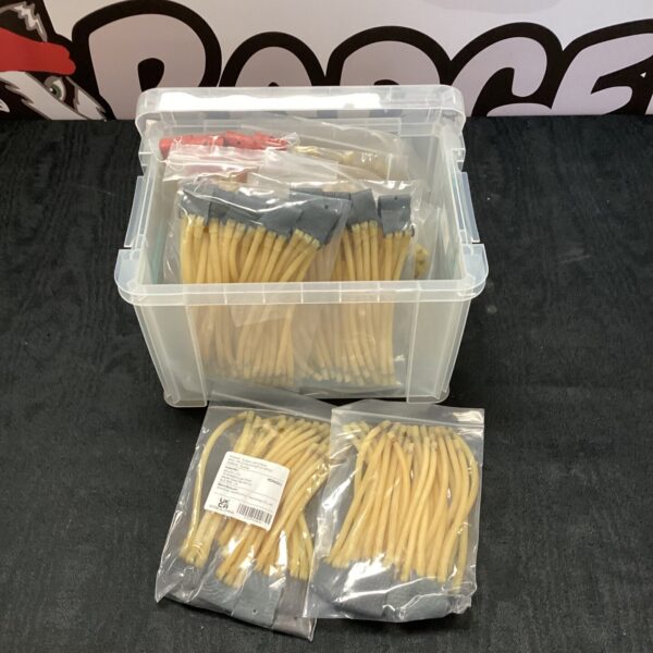 Clear plastic box filled with many rubber catapult bands.