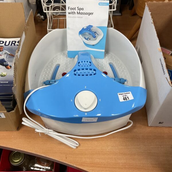 Blue foot spa massager presented for auction.
