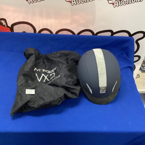 Black Whitaker VX2 riding helmet, size M, equestrian safety gear.
