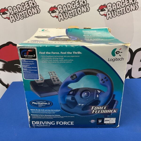Logitech Driving Force racing wheel for PlayStation 2 gaming.